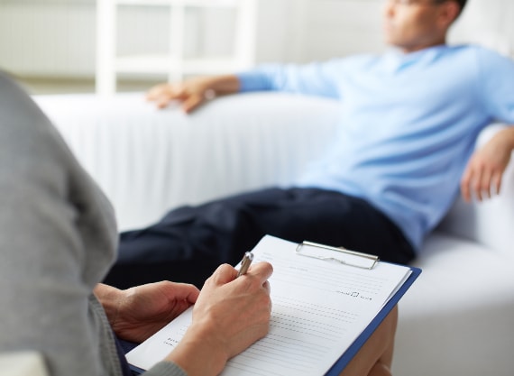 Man receiving counselling